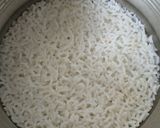 A picture of step 1 of Onion and Tomato Tempered Curd Rice.