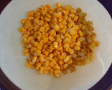 Foto del paso 5 de la receta: Arroz rojo con granos de elote y epazote