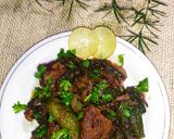 A picture of step 11 of Bhindi Gosht (okra).