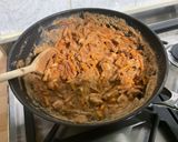 Une image de l'étape 23 de Poulet aux cacahuètes, carottes, tomates et épices.