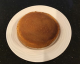 A picture of step 8 of Vanilla Layer Cake filled withLenon and Rasberry and frosted with Fresh Lemon Cream.