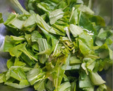 Foto del paso 5 de la receta: Rúcula con ajo picado