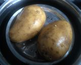 A picture of step 1 of Steamed and baked stuff potatoes.
