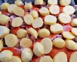 Savanyú káposzta ágyon sült karaj, burgonyával borítva recept fázis 2 fotója