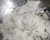 A picture of step 5 of Dessicated coconut rice.