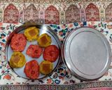 A picture of step 15 of Kaju ki burfi (cherries 🍒 and rose flavour) and laddoo (pan flavour).