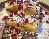 Foto del passaggio 6 della ricetta Quadrotti di polenta con frutta secca e melagrana