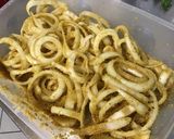 Une image de l'étape 5 de Oignons croustillants aux épices et parmesan.