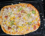 A picture of step 3 of Veg Pizza.