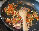 A picture of step 3 of Quinoa stuffed peppers.