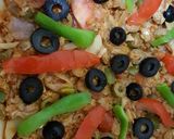 صورة لخطوة 3 من وصفة بيتزا بالتونة 🐟🍕👌👍