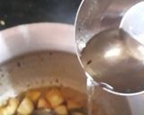 A picture of step 3 of Raw mango khatti mithi sabji.