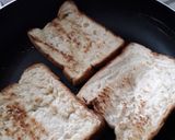 A picture of step 2 of Toasted bread with fried potatoes n egg stick.