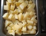 Foto del paso 5 de la receta: Papas al vinagre y doradas al horno