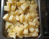 Foto del paso 5 de la receta: Papas al vinagre y doradas al horno