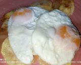 Foto del paso 6 de la receta: Langosta al ajillo con huevos fritos y patatas panadera