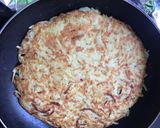 Foto del paso 5 de la receta: Tortilla de papa rallada