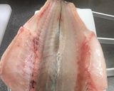 Foto del paso 1 de la receta: Lubina a la plancha con refrito de ajos, patatas panaderas y lechugas variadas