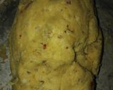 A picture of step 5 of Besni masala prahta with tomato souce.