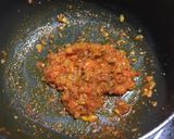 A picture of step 5 of Brinjal bharta.