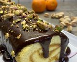 Foto del passaggio 12 della ricetta Rotolo al mandarino cioccolato e pistacchio