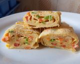 A picture of step 6 of Omelette Egg Roll.