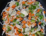 A picture of step 3 of Chicken Veg Fried Rice.