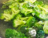 A picture of step 2 of Easy Italian Herb Broccoli 🥦 with Roasted Red Peppers.