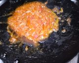A picture of step 3 of Tawa masaledar kale chanay.