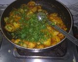 A picture of step 2 of Aloo (potato) bada with curry.