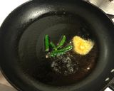 A picture of step 2 of Mulo Chingri Chechki Radish Prawn Stir Fry Bengali style.