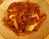 Une image de l'étape 8 de Poutine au Jambon.