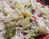 A picture of step 1 of Patiala pulav with tomato curry.