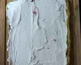 A picture of step 5 of Raspberry & Pistachio Rolled Yule Log.