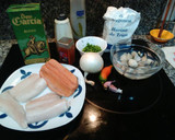 Foto del paso 1 de la receta: Merluza y salmón en salsa verde