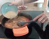 Foto del paso 3 de la receta: Arroz con patas mollejas y cuellos de pollo