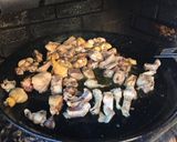 A picture of step 2 of Paella with Vegetables and Meat.