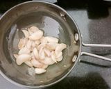 A picture of step 5 of Pink sauce Pasta with Cheesy Garlic Bread.