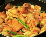 A picture of step 4 of Squid cubes and beans stir fry in kerala spicy-roast coating.