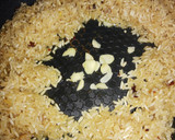 Foto del paso 2 de la receta: Arroz desglazado con cilantro cimarrón y ajo