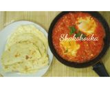 Foto langkah ke 6 dari resep Shakshouka (olahan telur dalam saus tomat).