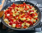A picture of step 14 of Endive Gratin with Red Bell Peppers, Ham, Honey, and Curry.