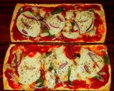 A picture of step 7 of Mike's 10 Minute Salt Brick Pizza Margheritas.
