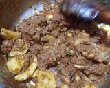 A picture of step 4 of Alu gosht.