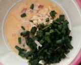 A picture of step 12 of Egg perfecto/Moglai.