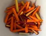 A picture of step 3 of Roasted Carrots with Thyme, Oregano, and Parsley.