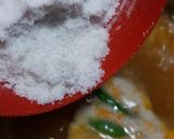 A picture of step 4 of Daal Chawal with fry Fish.