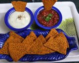 A picture of step 11 of Lentil Nachos with salsa and sauce.