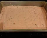A picture of step 8 of Fresh Strawberry Chip Cake with Lemon Cream Frosting.