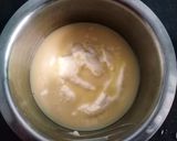 A picture of step 2 of Bhapa Doi Steamed yoghurt pudding.